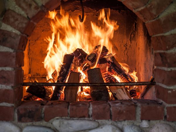 Lit fireplace in Elm Grove, WI.