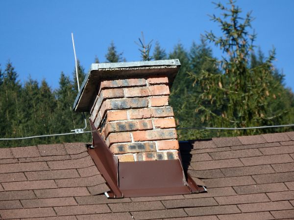 Chimney leak due to poor chimney flashing, Elm Grove, WI.