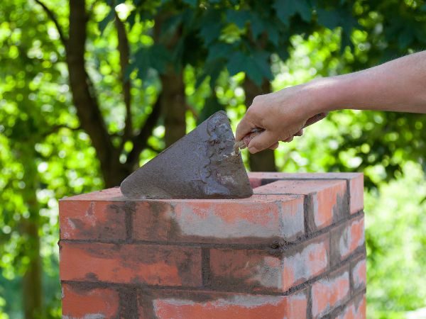 Professional tuckpointing in progress, Elm Grove, WI.