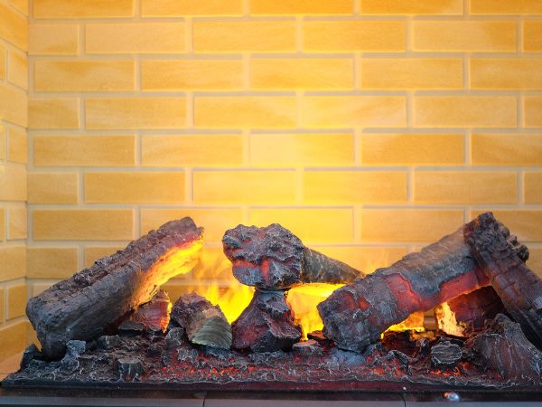 A lit fireplace in Elm Grove, WI.